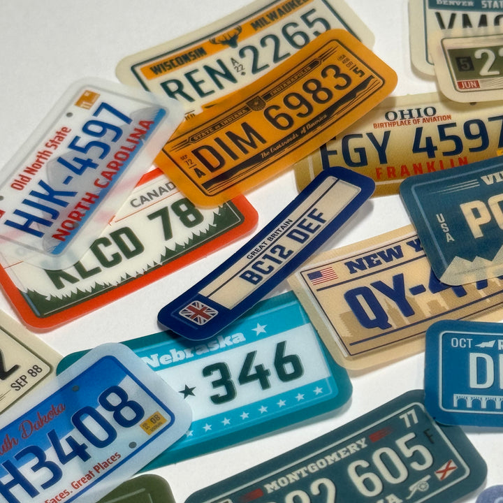 GLOBAL LICENSE PLATES Peelable Stickers  ~ 45 Pieces ~ Each Sticker is 38mm