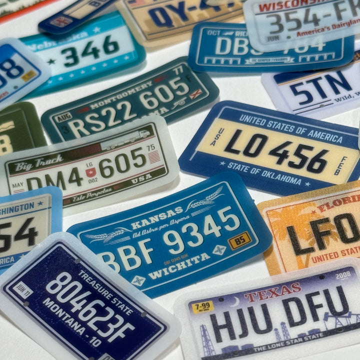 GLOBAL LICENSE PLATES Peelable Stickers  ~ 45 Pieces ~ Each Sticker is 38mm